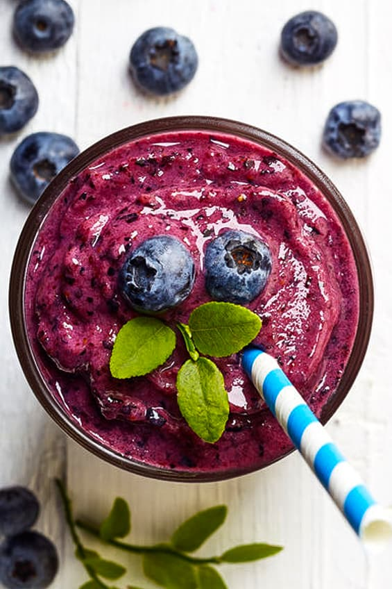 Vibrant green smoothie with berries